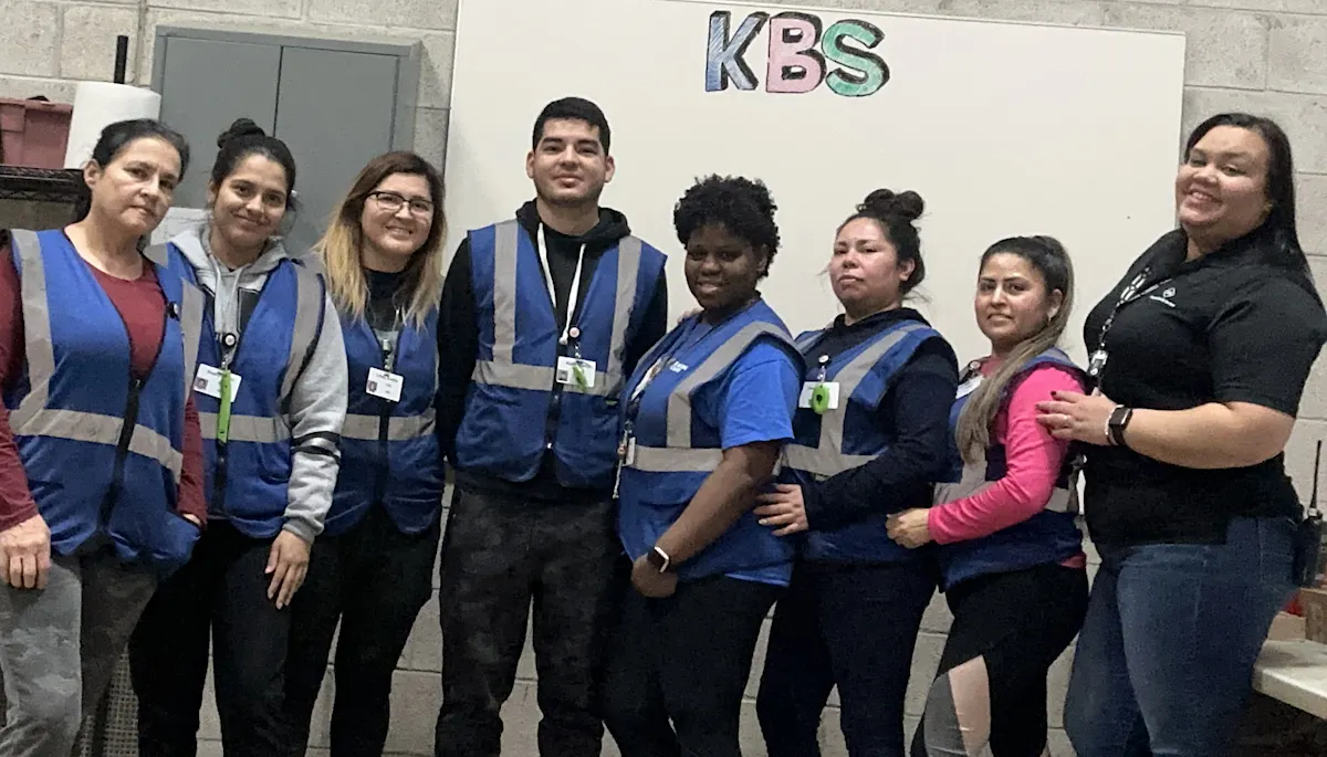 KBS cleaning team pose for a photo