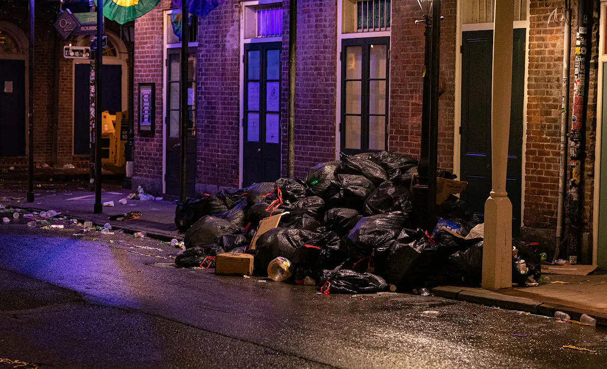 Trash piles up during Mardi Gras