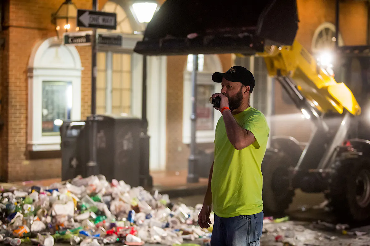 A KBS/Empire Services crew member manages operations during the clean up at Mardi Gras