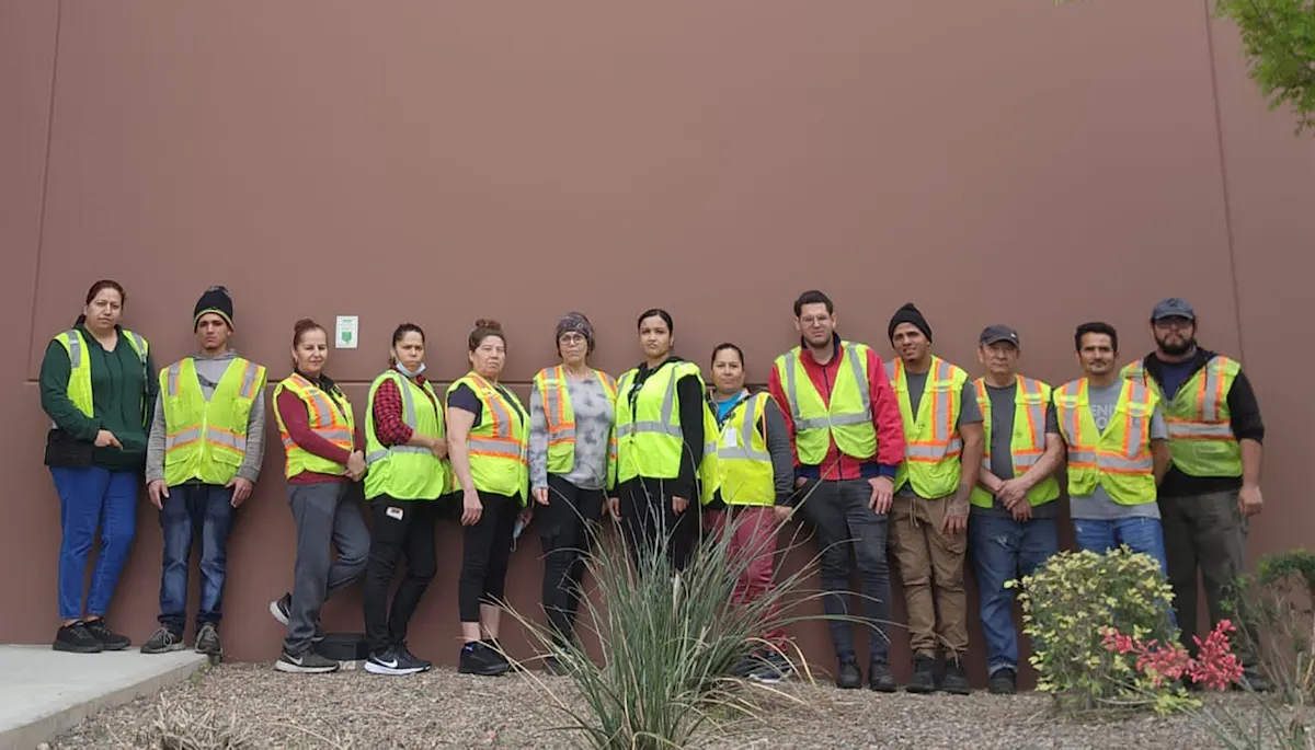 KBS warehouse team pose for a photo
