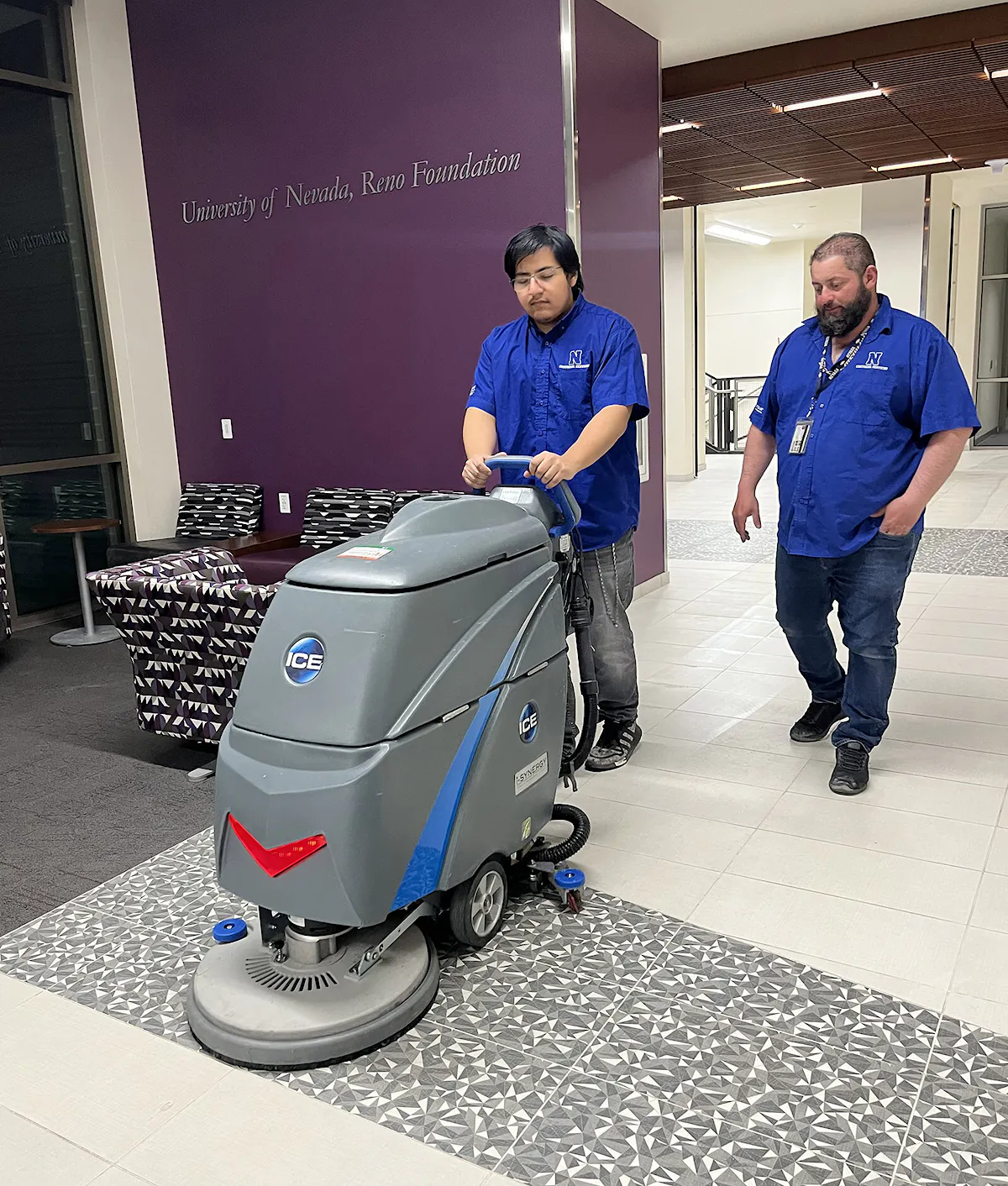 KBS crew members work together in a educational facility